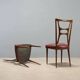 Set of six 1950s chairs with burgundy seats.
