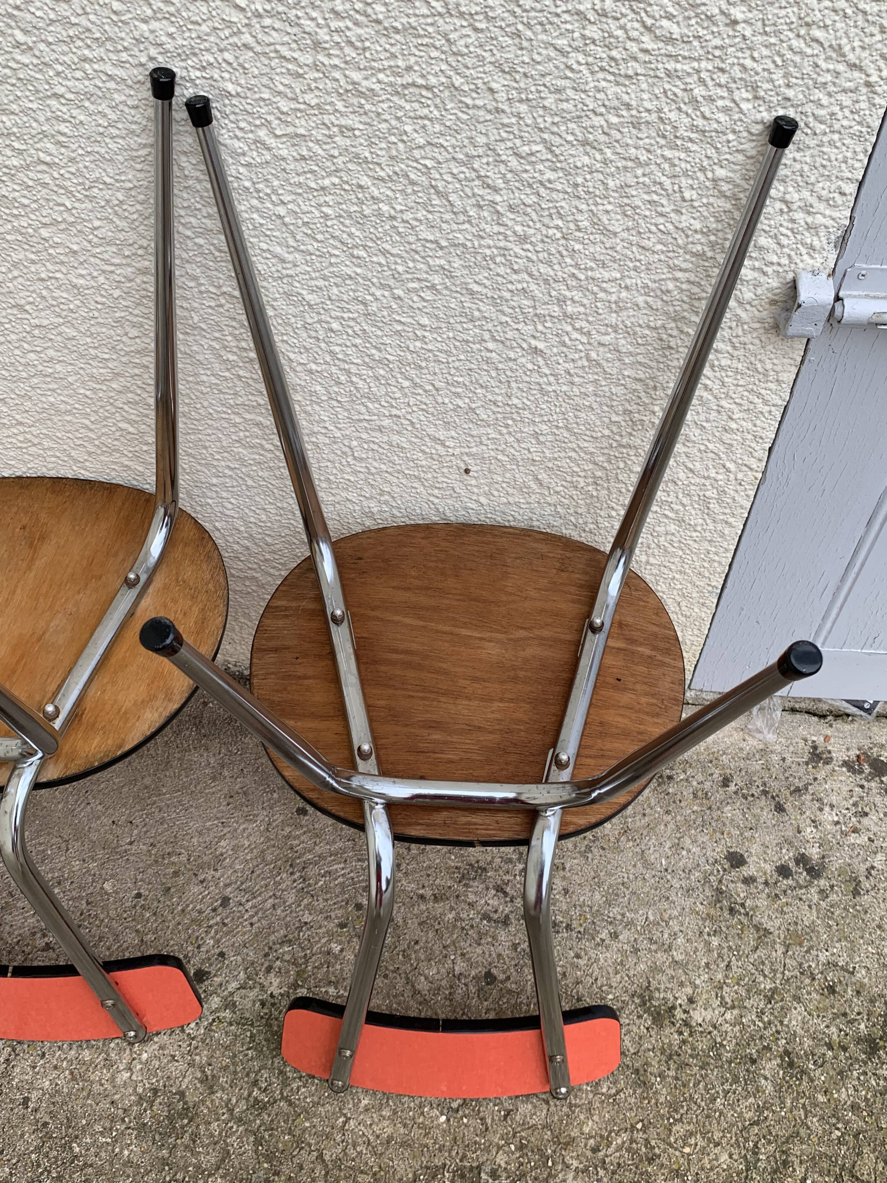 Red formica chairs 1950