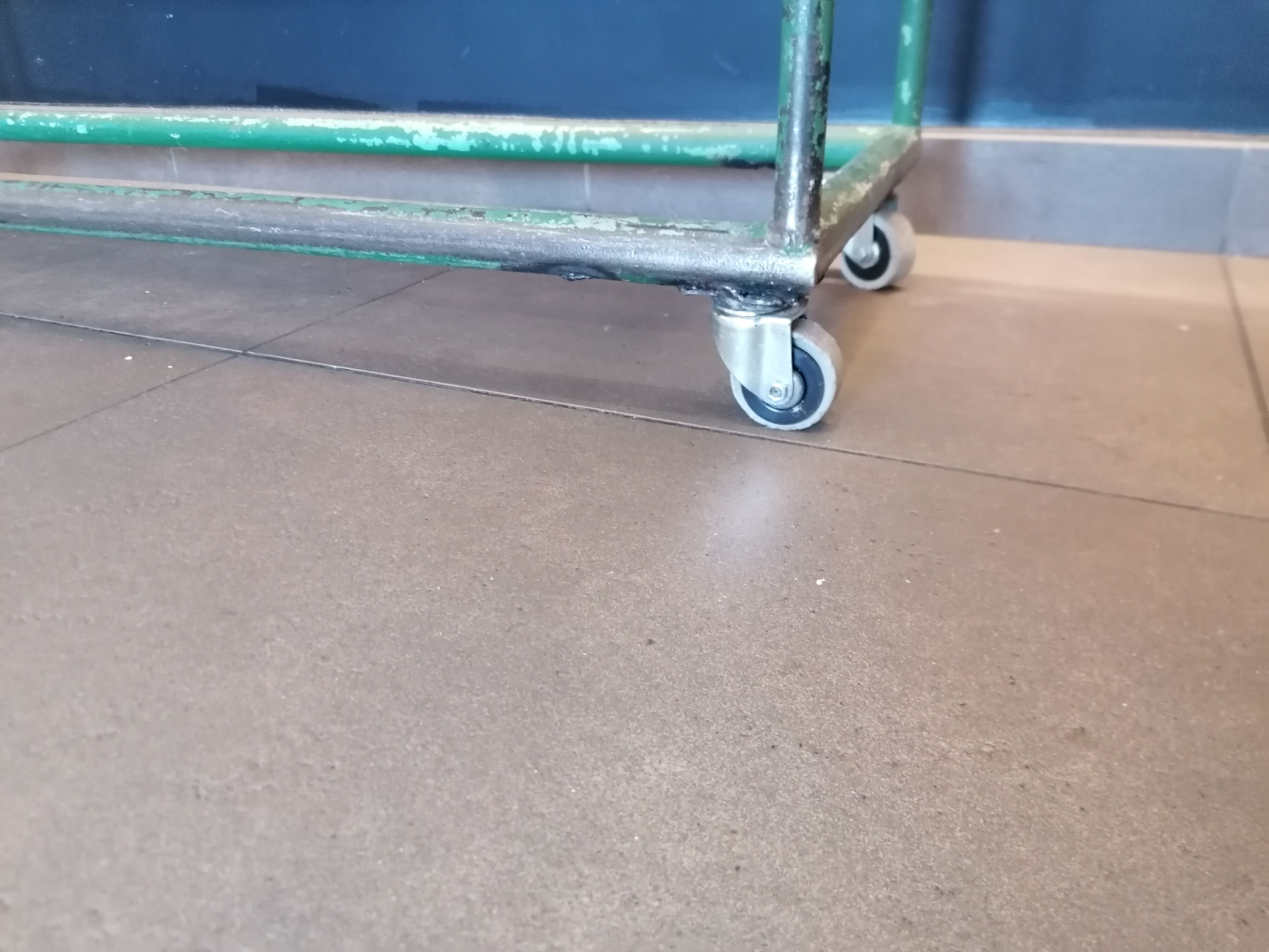 Steel and wooden shelf on wheels