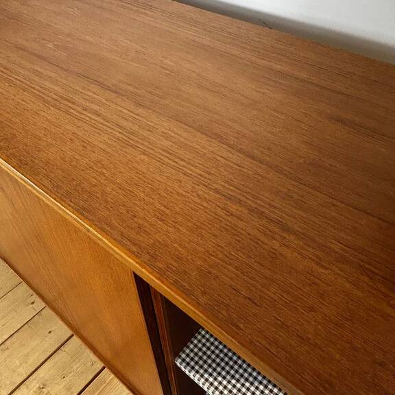 Teak sideboard with sliding doors, 1960s