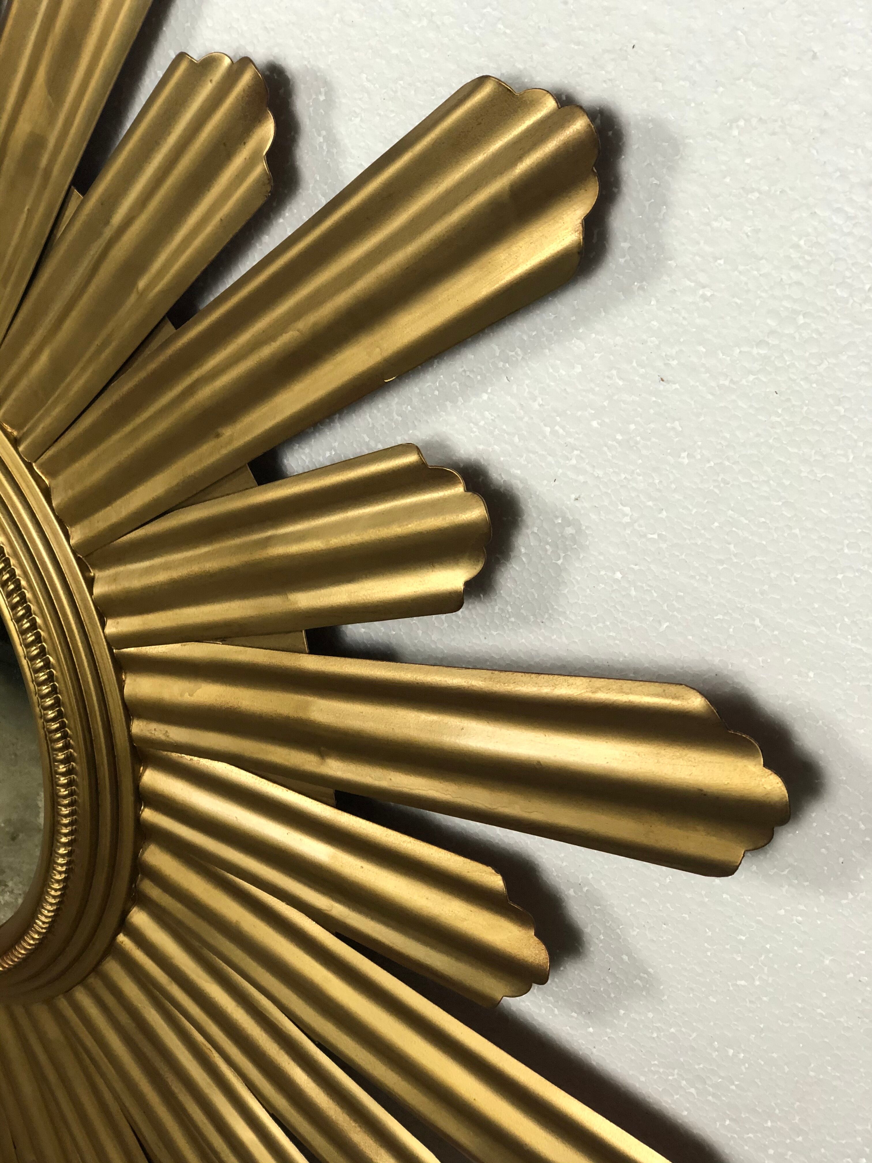 Sun mirror "André" in gilded sheet metal witch eye