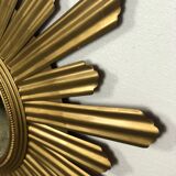 Sun mirror "André" in gilded sheet metal witch eye