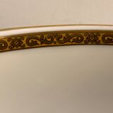 Limoges porcelain salad bowl Bernardaud, gilded Greek decoration, twentieth century