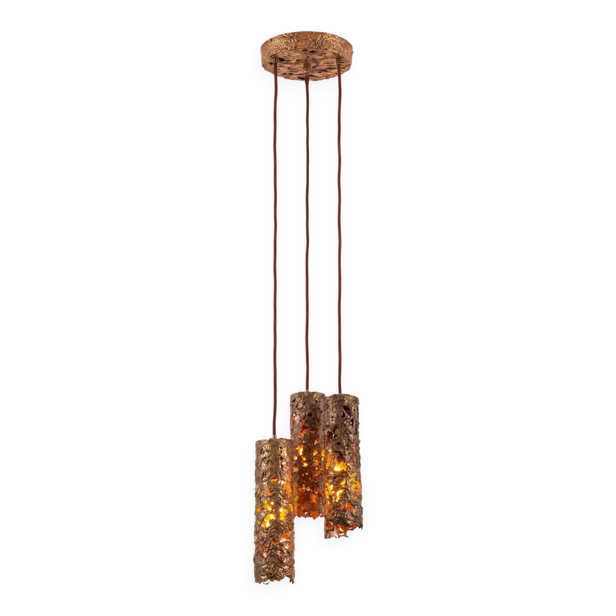Suspension composed of 3 brutalist copper lamps by Aimo Tukiainen, 1960s.
