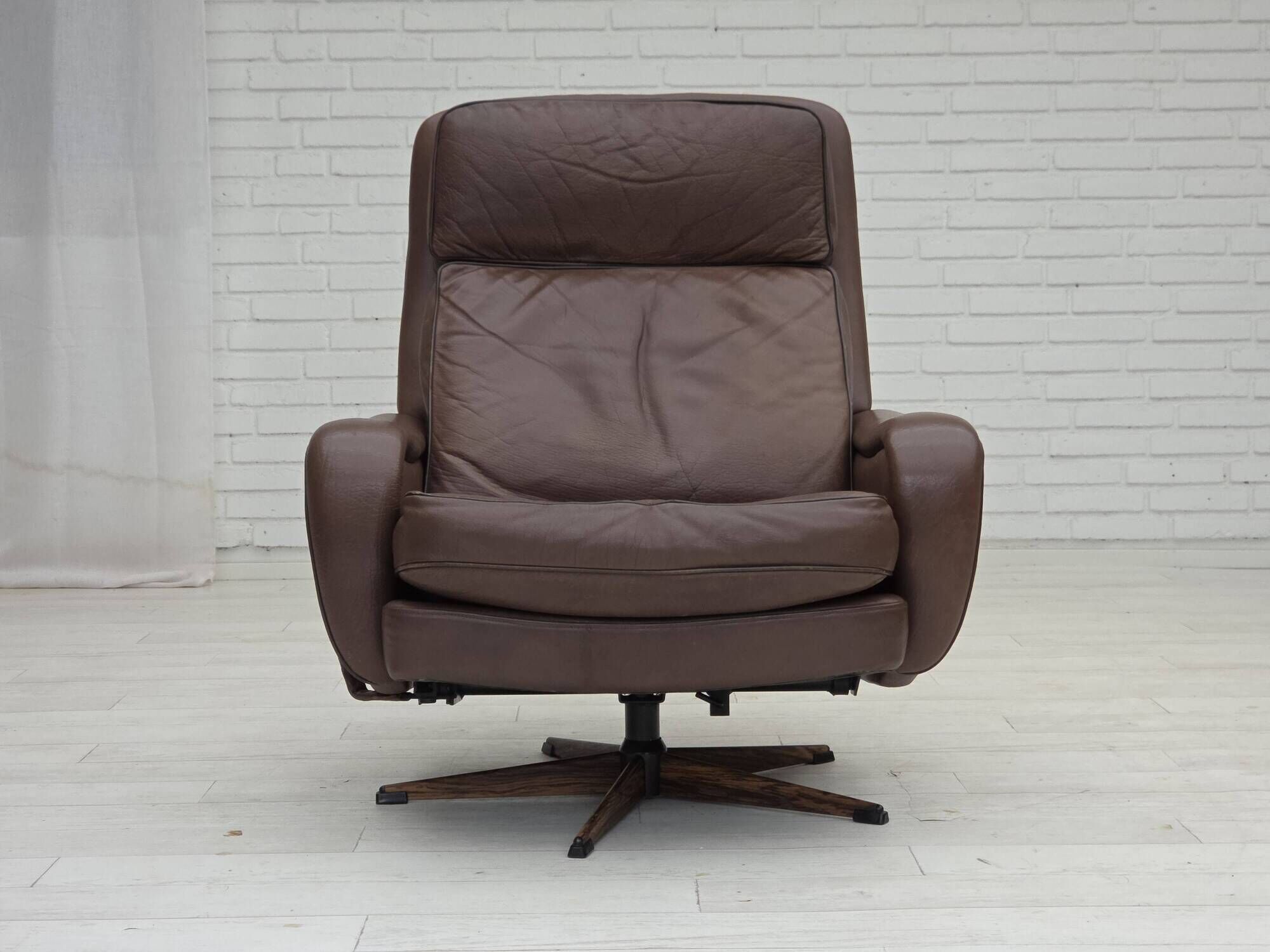 1970s, Danish swivel armchair with footstool by Madsen & Schubel.