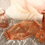 Pink glass liquor service and its accessories from the 1950s