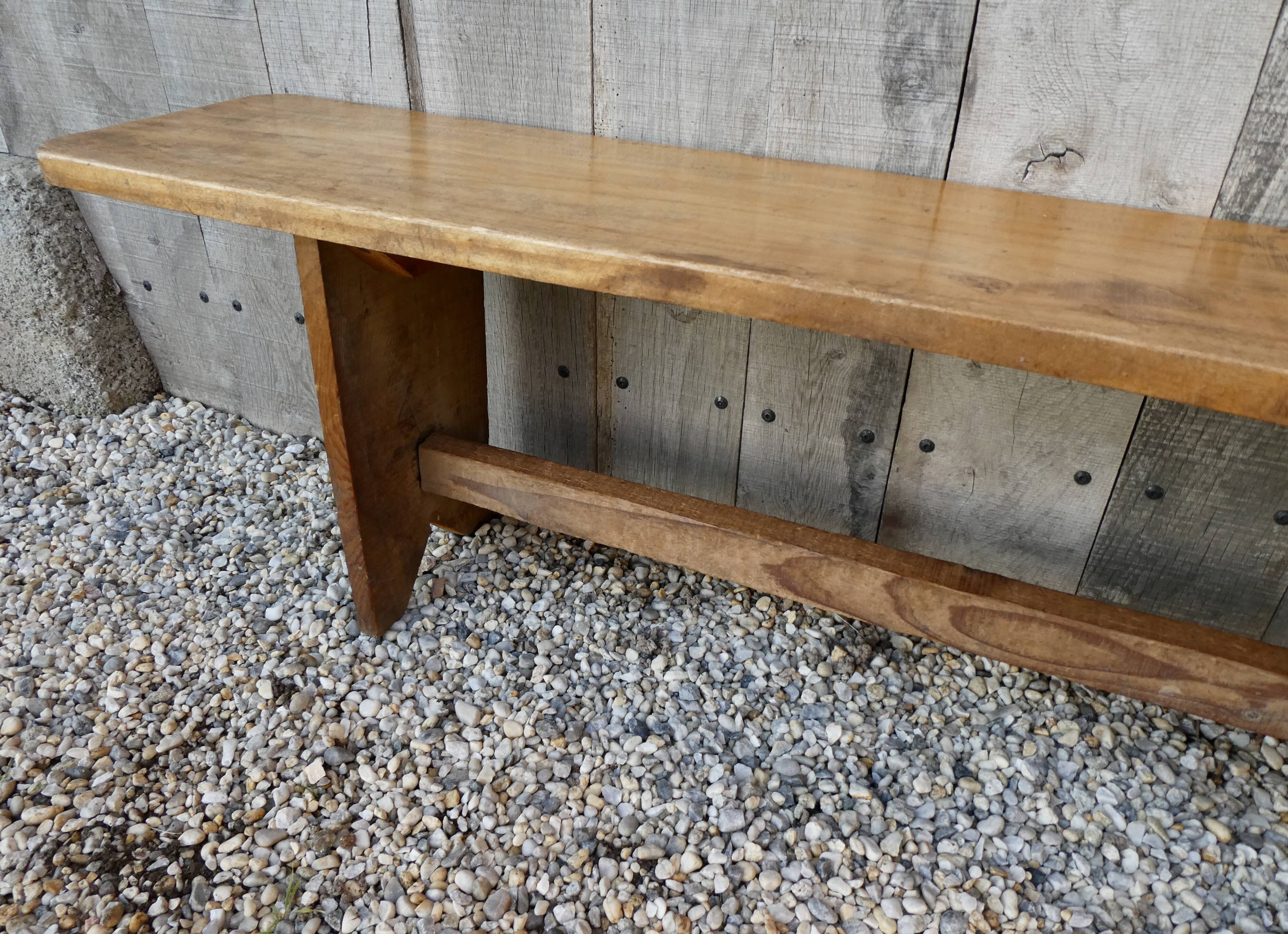 Wide solid wooden bench