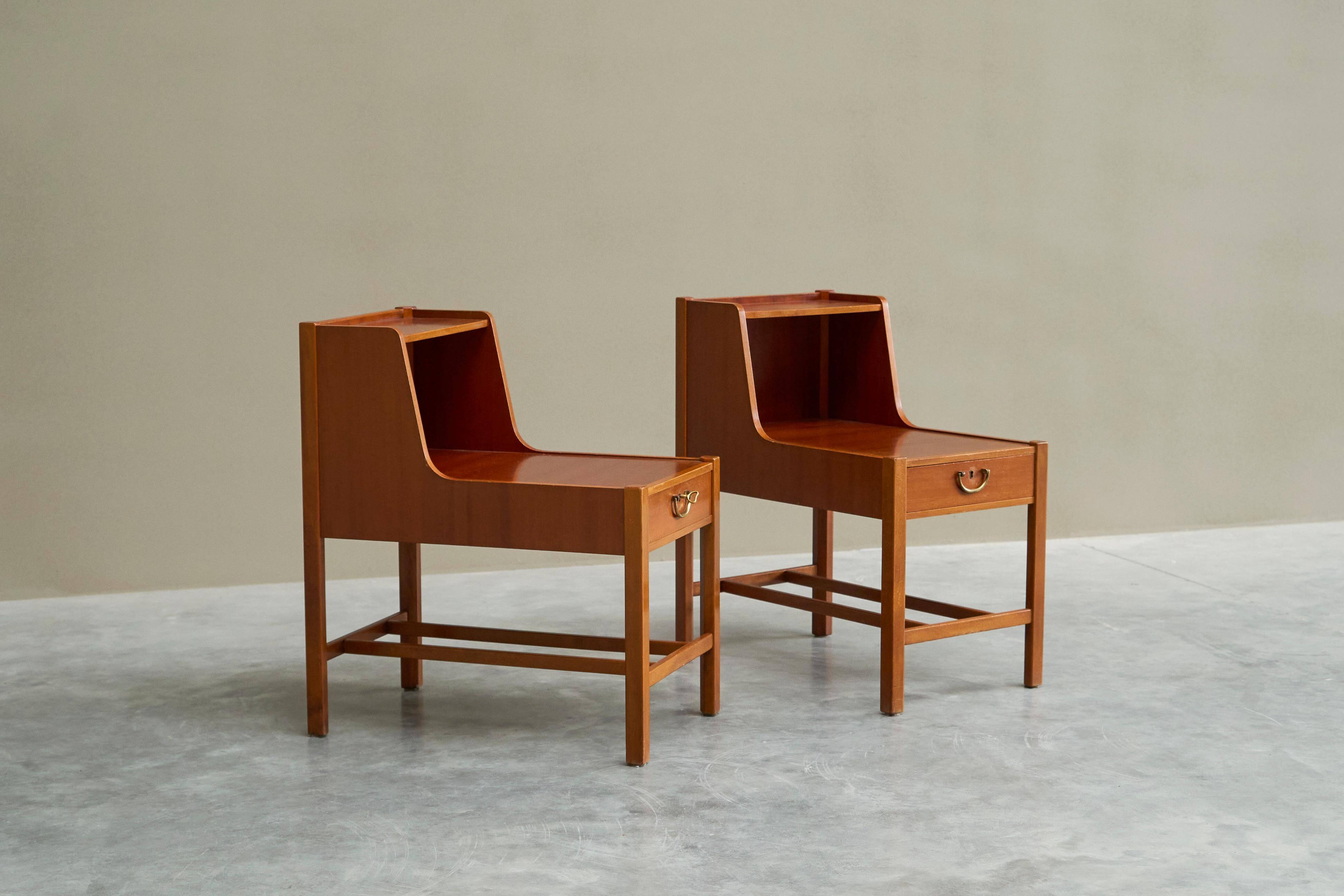 Pair of bedside tables by Nordiska Kompaniet in teak, 1952, by David Rosén.