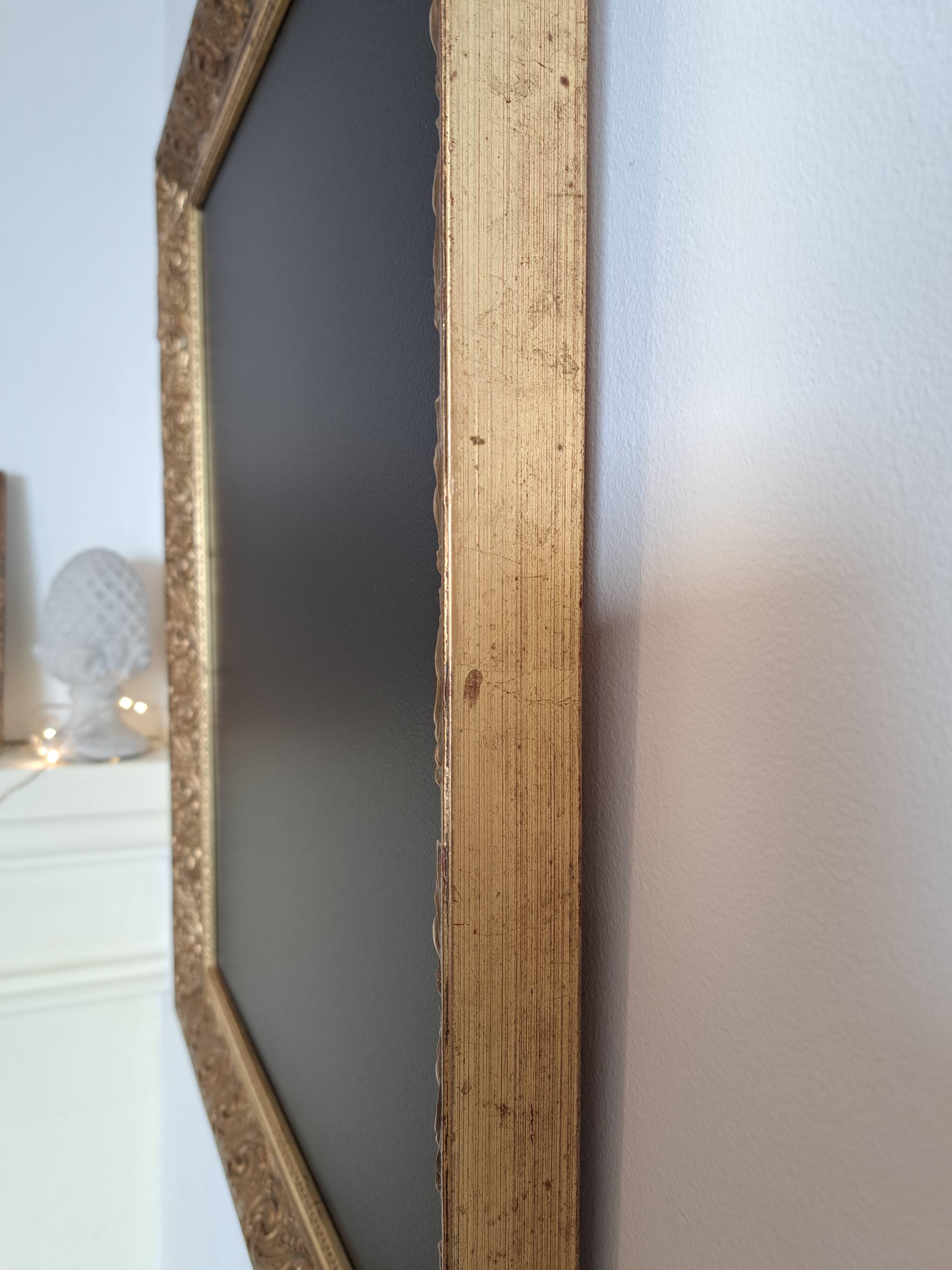 Slate table framed in gold leaf style