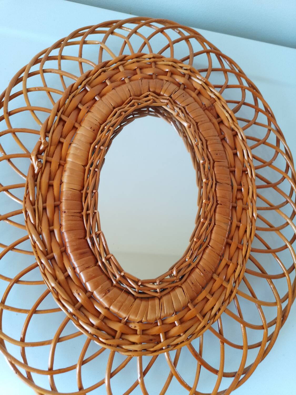 Woven rattan mirror