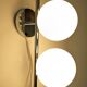 Double Space Age wall light in frosted white glass, France circa 1970.
