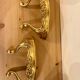 Pair of gilded wall shelves