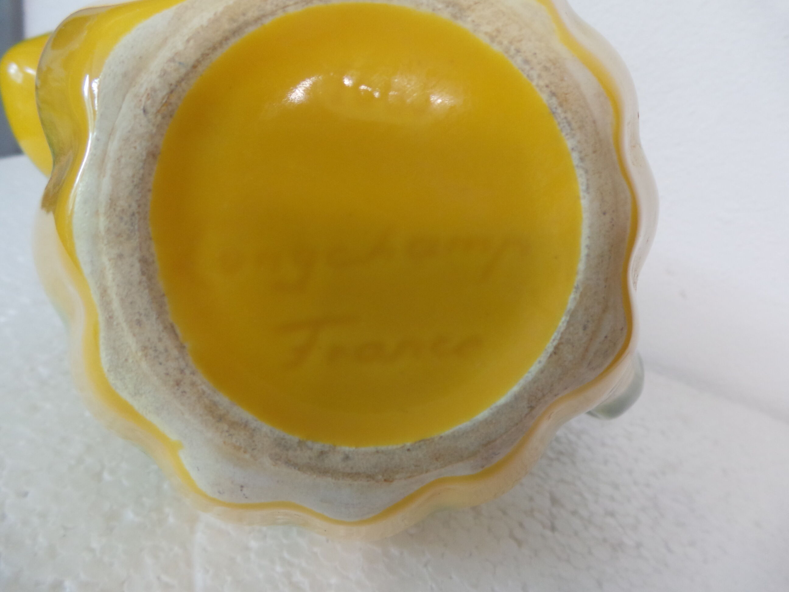 Green and yellow vintage pitcher