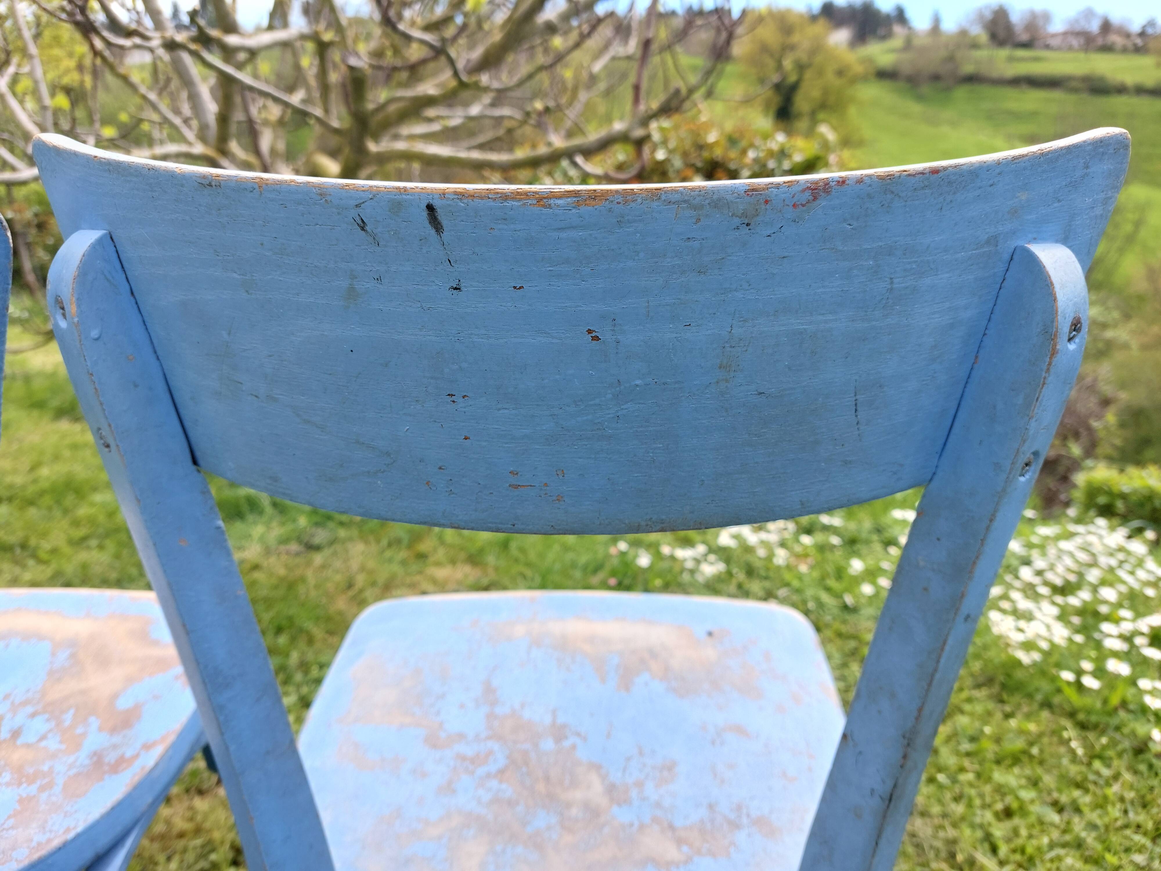 pair of chippy blue paint bistro chairs