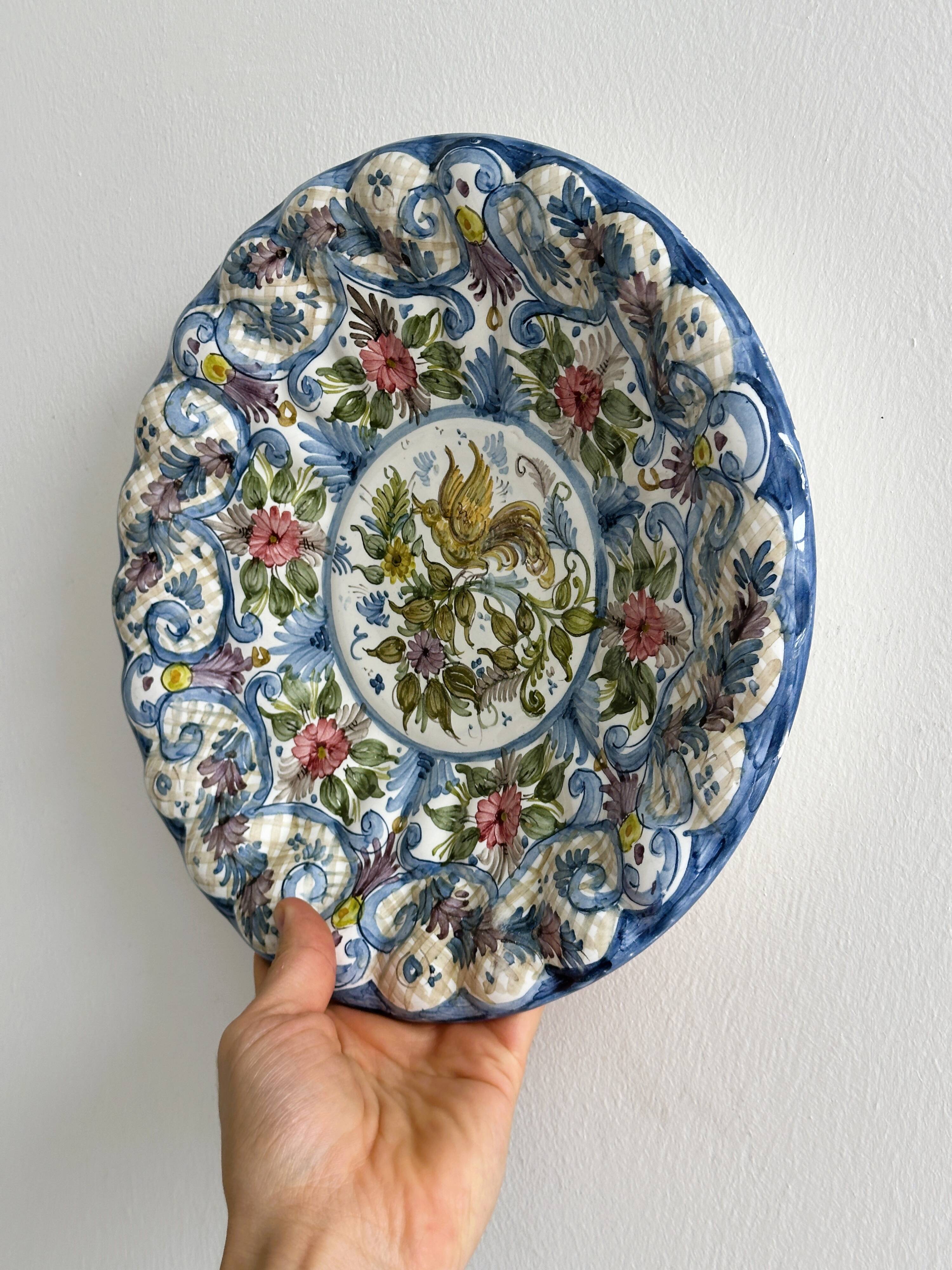 Large decorative dish hand painted with floral and bird motifs