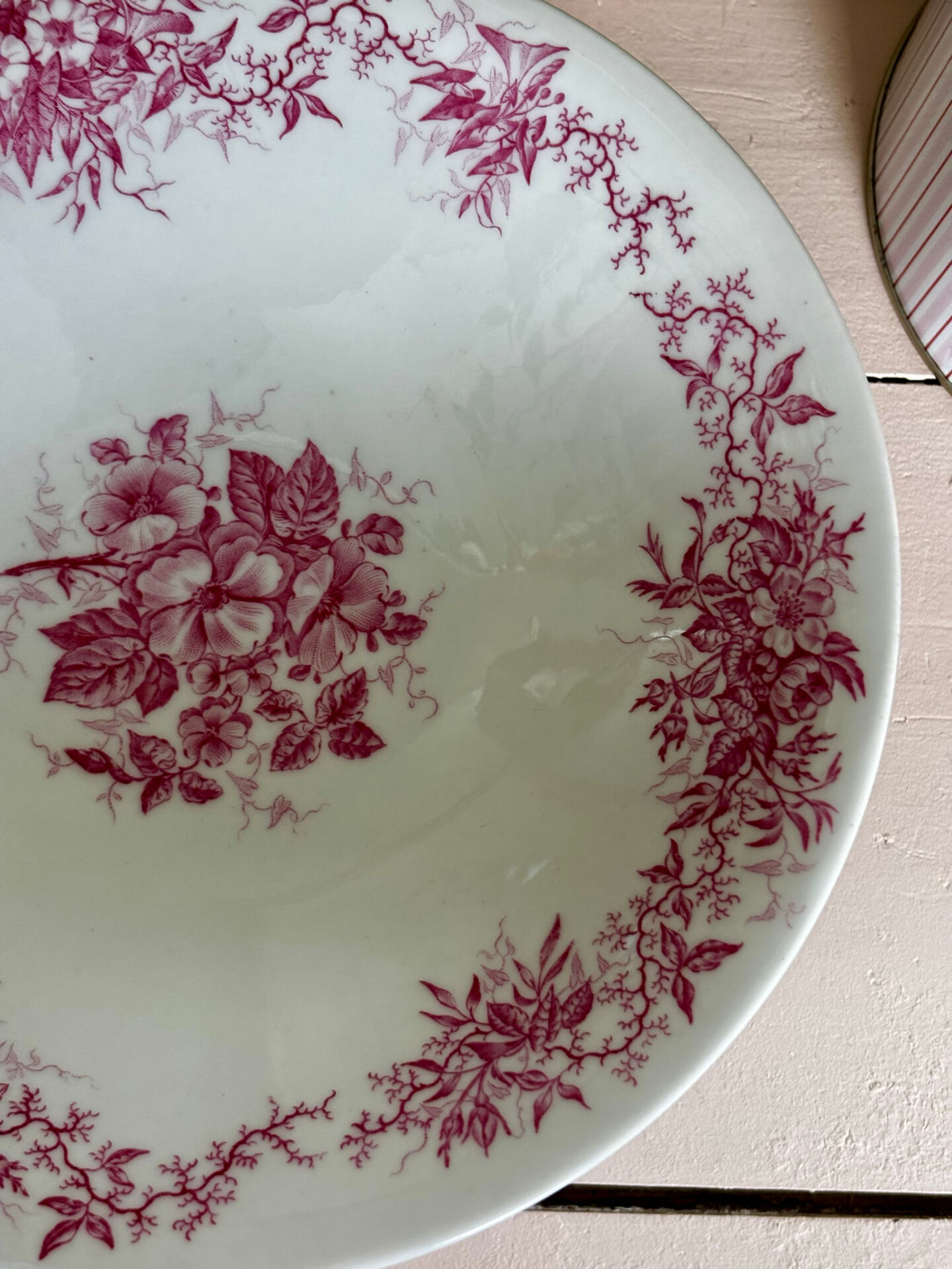Magnificent antique compote fine porcelain with pink floral decoration.