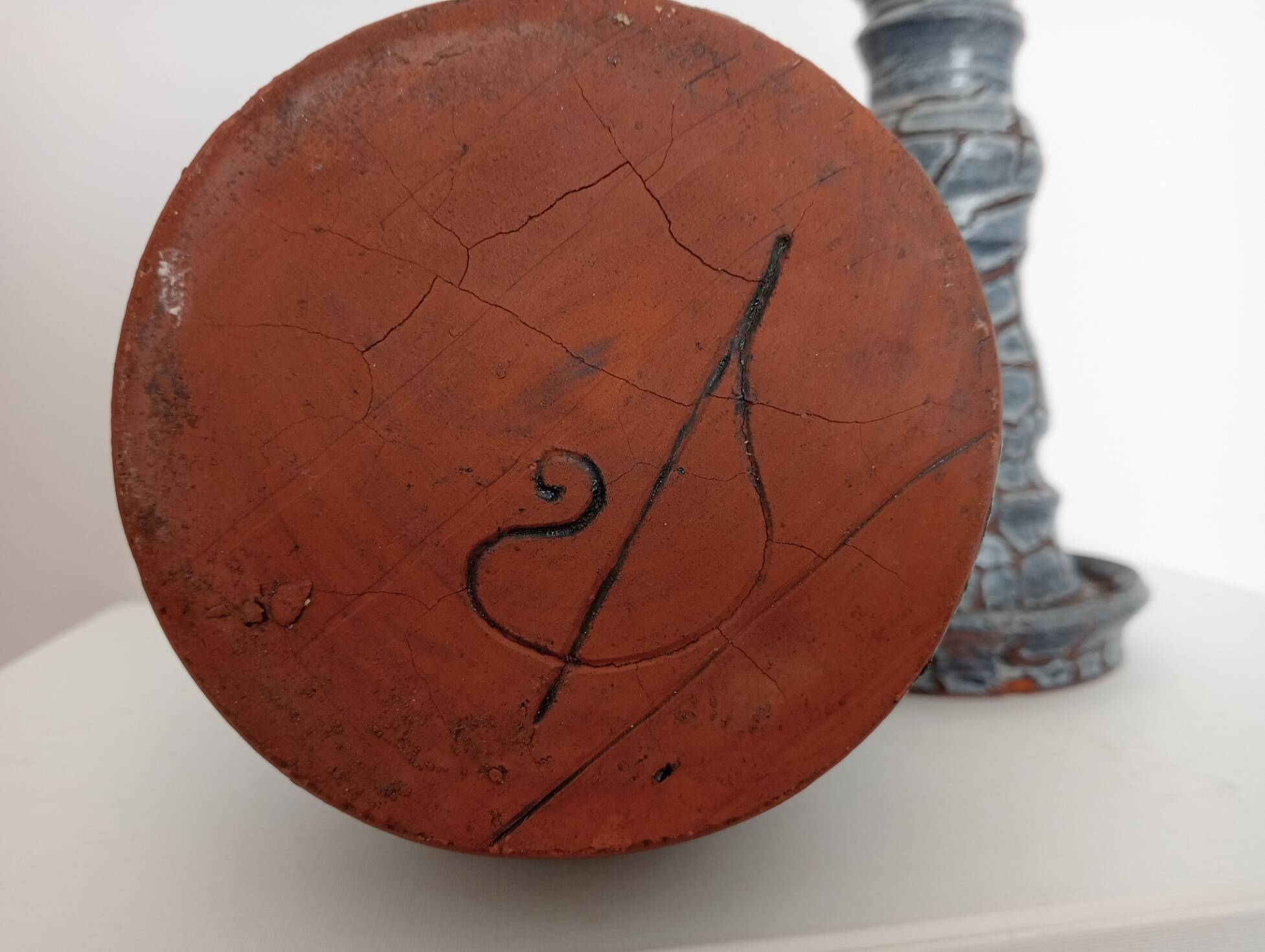 Blue glazed terracotta vase and candle holder