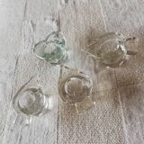 Set of four small transparent glass candle holders 3 spikes 1 heart