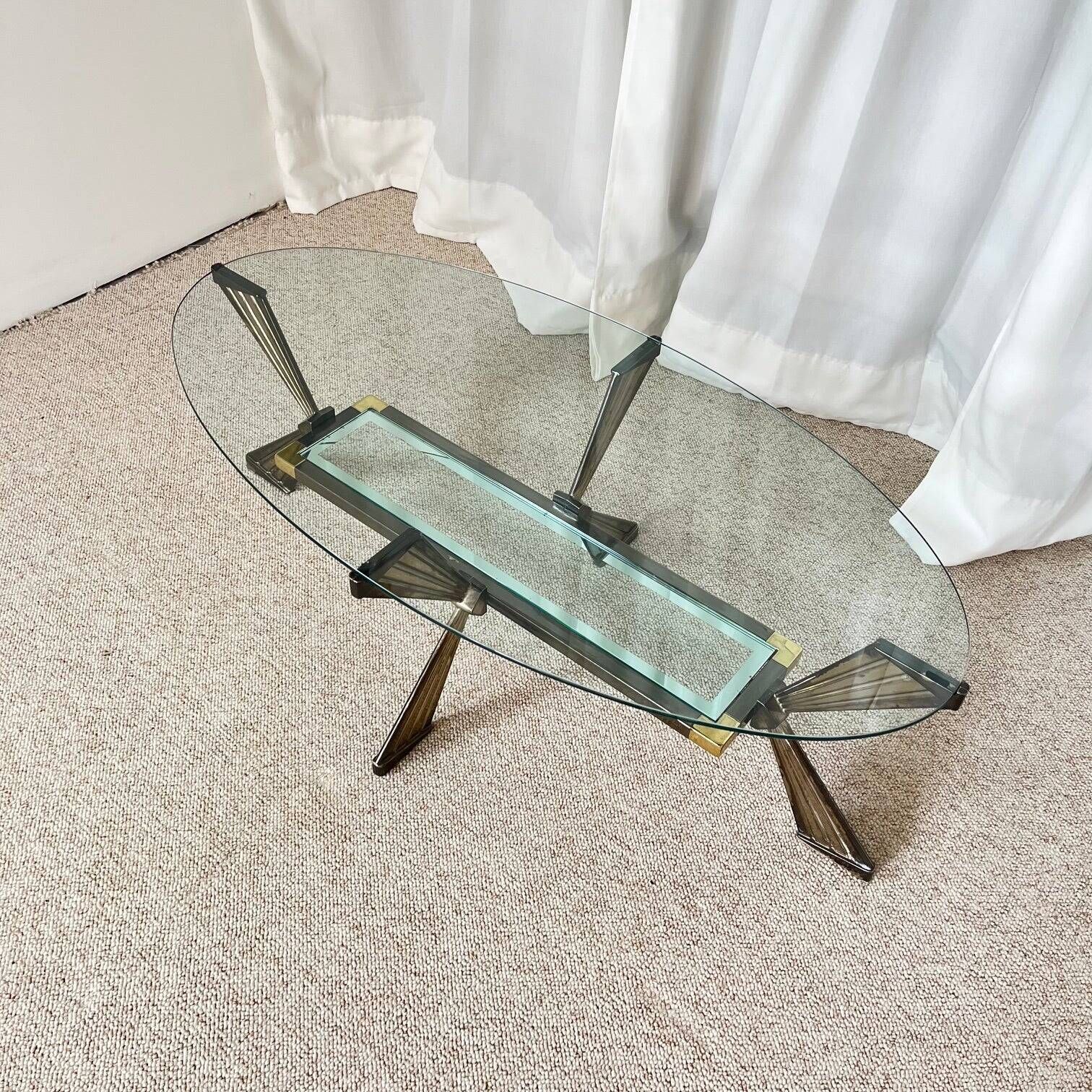 Vintage Italian coffee table in glass, chrome and brass metal, Hollywood Regency style, 1970s.