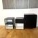 Vintage 1970s Space Age bedside tables in wood and black.