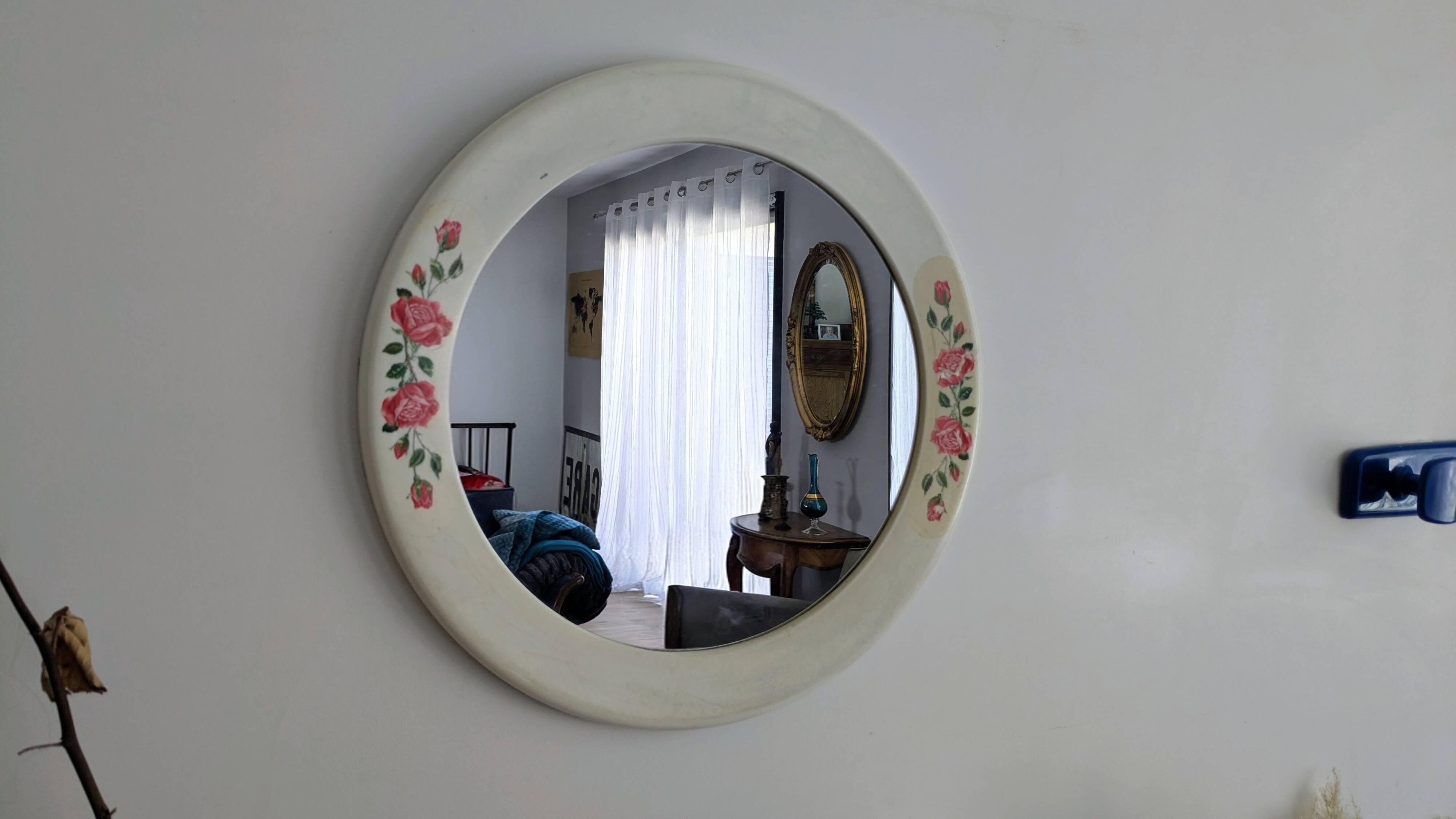 Vintage round mirror Syla model 6131 with rose decoration.