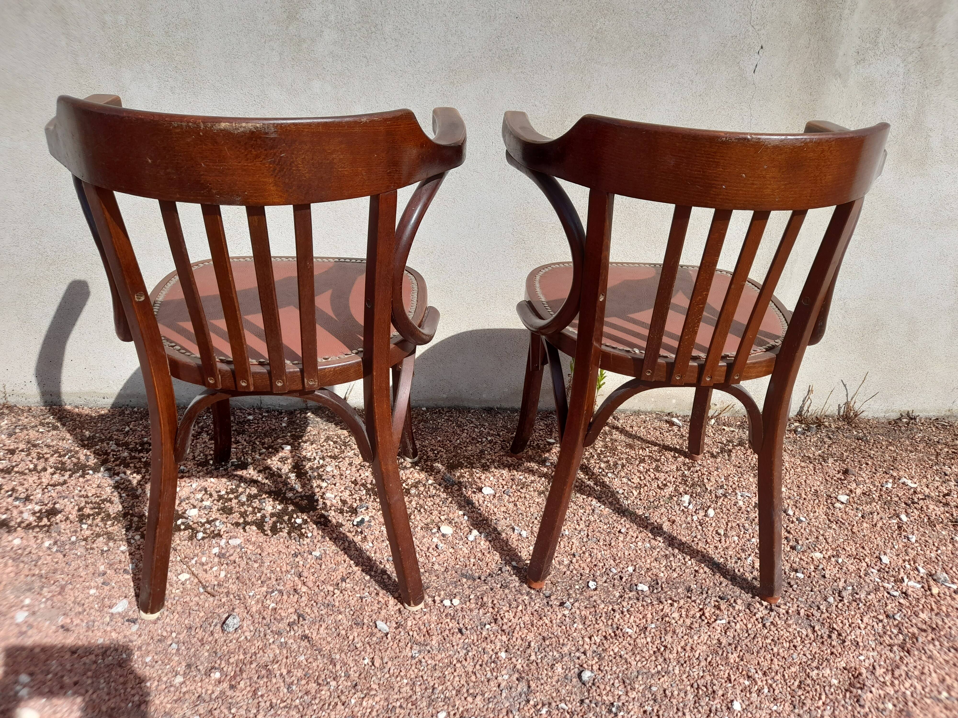 Pair of bistro armchairs signed Baumann 1930