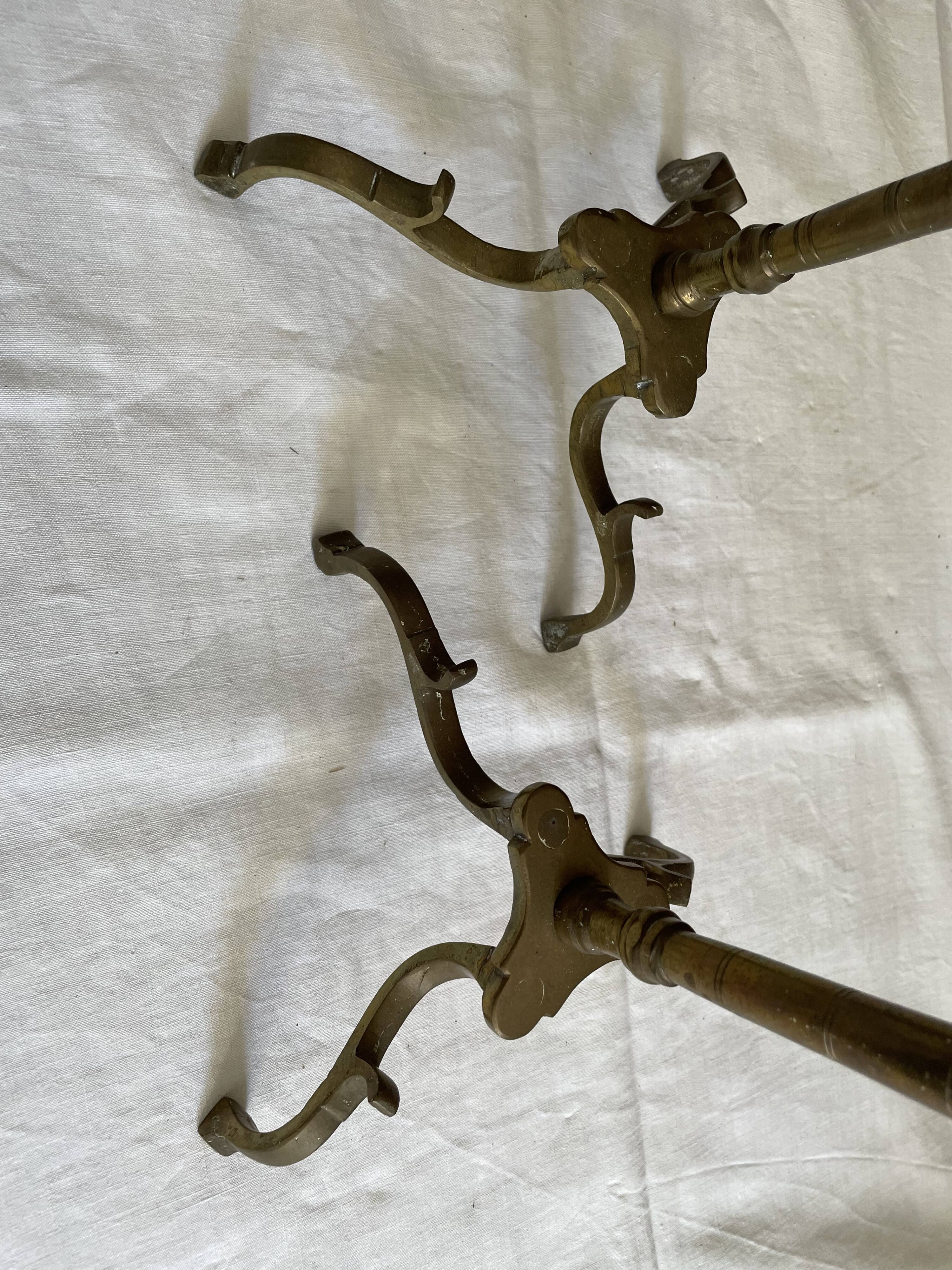 Pair of 3-spoke brass candlesticks