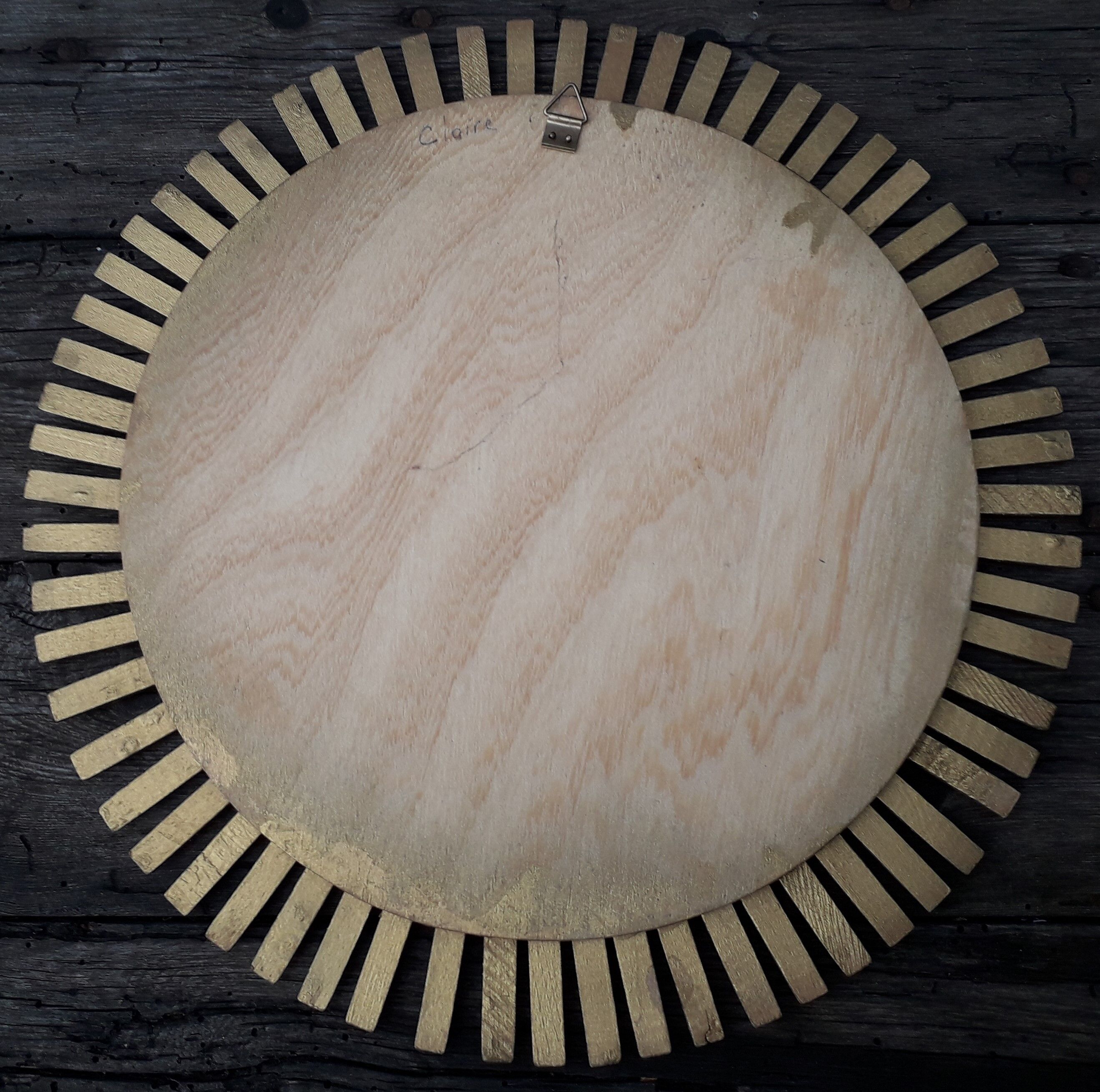 sun mirror in clothespins in gilded wood 32 x32 cm