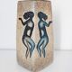 African ceramic vase decoration woman
