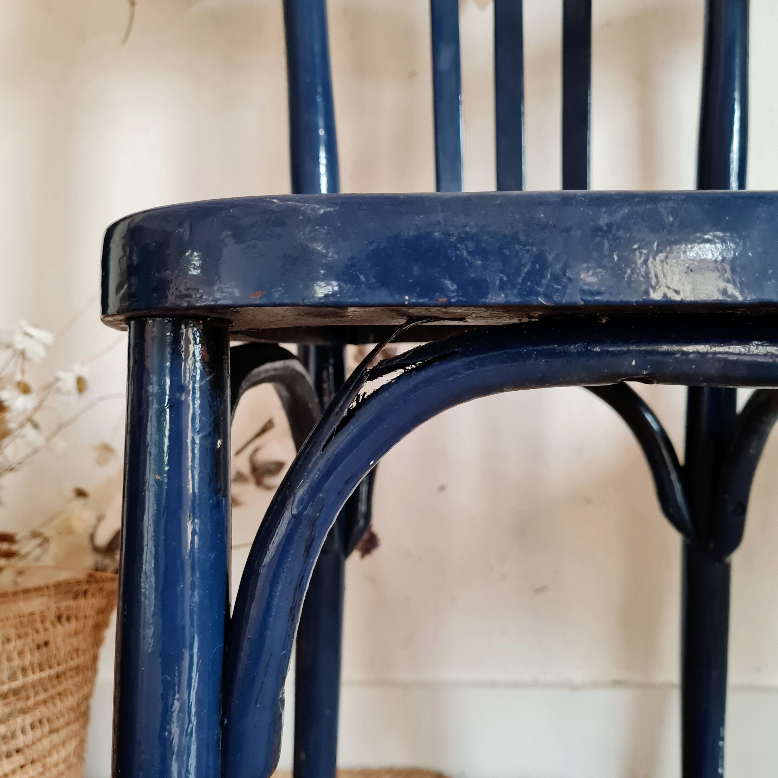 Duo of old blue bistro chairs