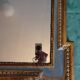 Old large Louis XVI style wall mirror