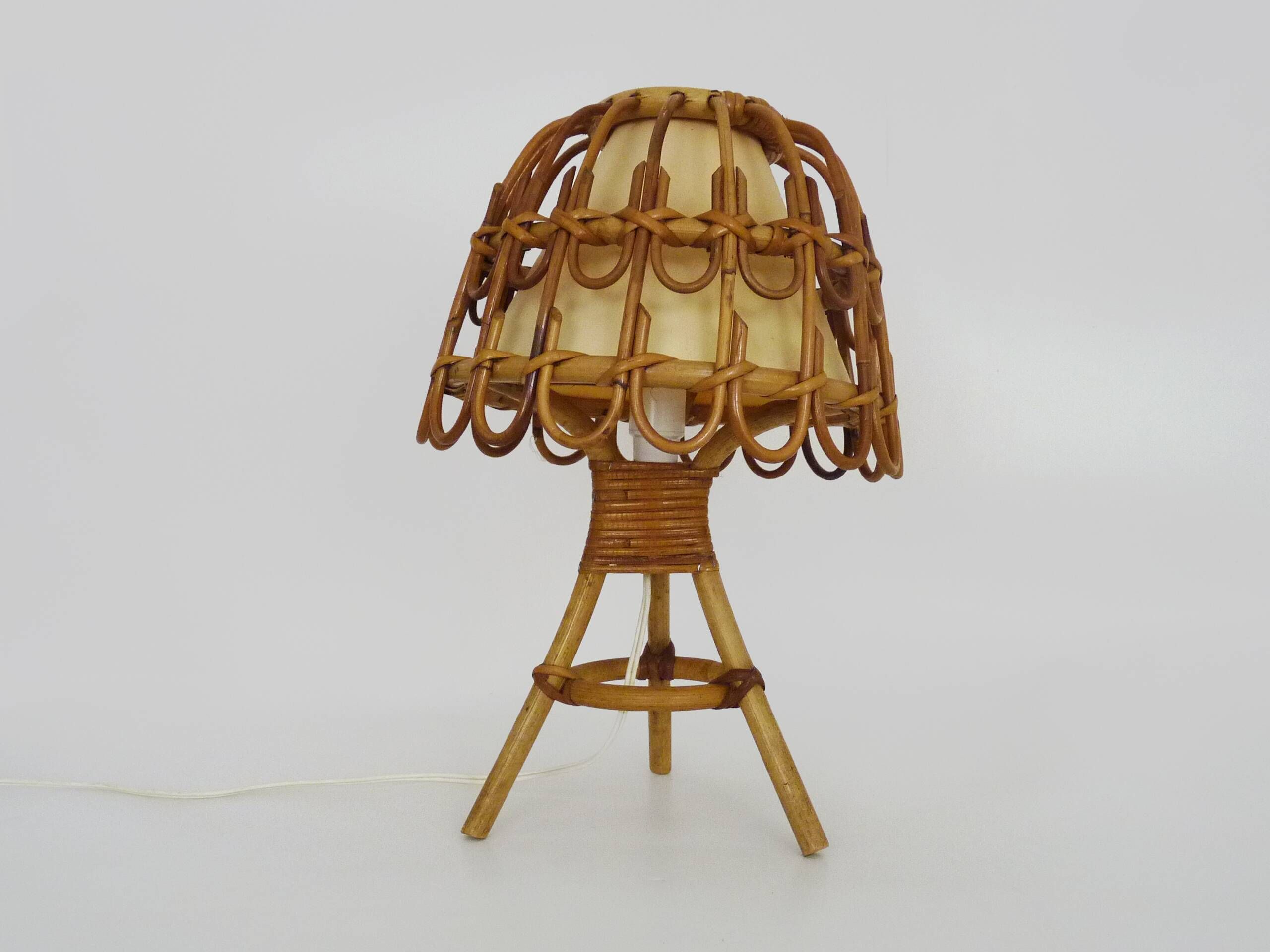 Rattan lamp in the style of Louis Sognot from the 1950s.