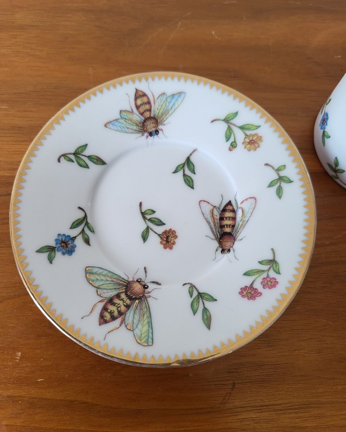 Cup and saucer in porcelain Henriette Bee pattern