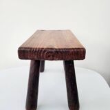 Old small solid wood milking stool