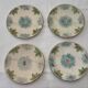 Lot de 4 assiettes en barbotine début XXème