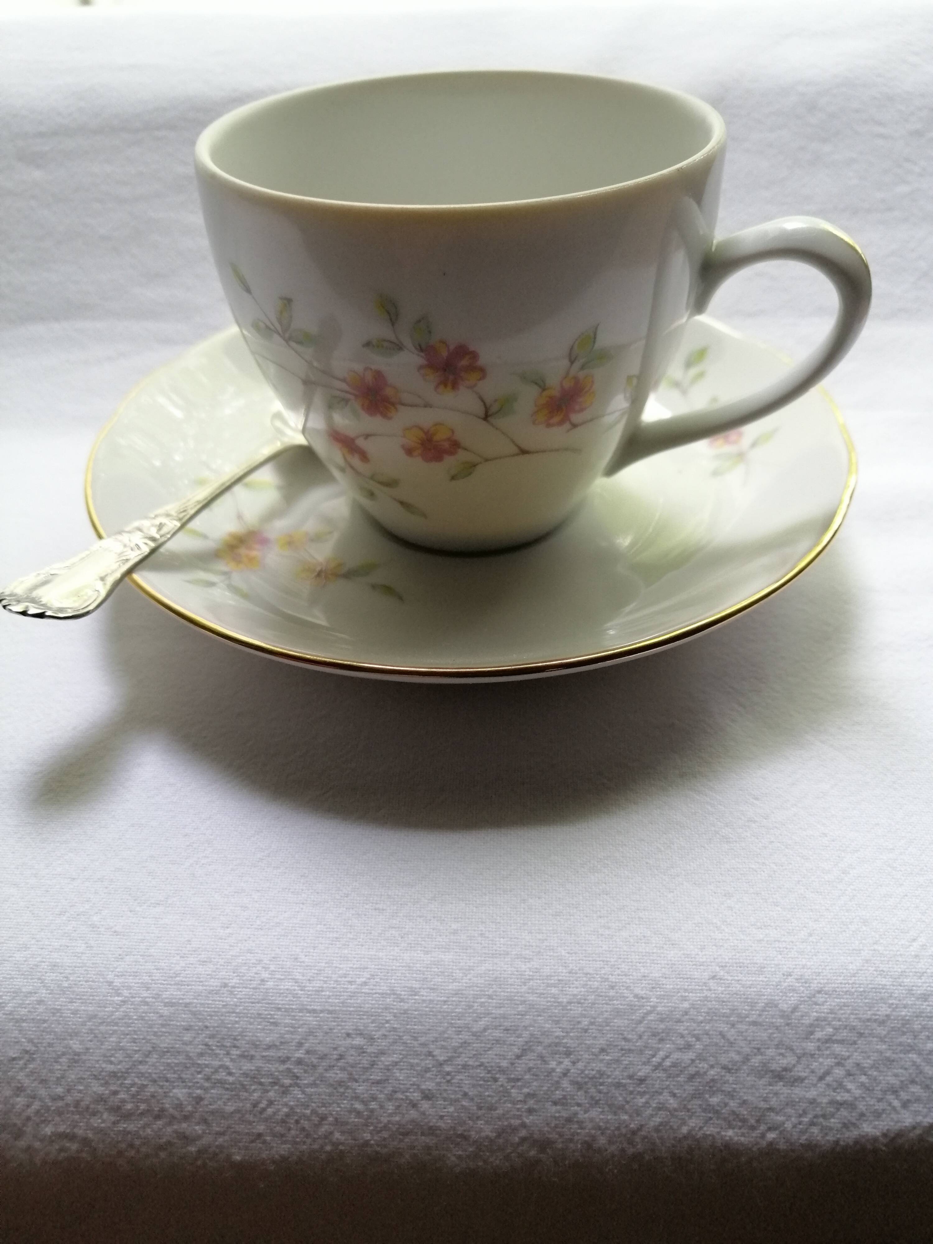 8 small silver spoons