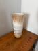 Large hand-blown glass vase in brown and beige.