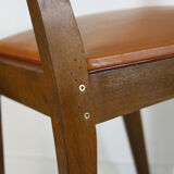 Set of four chairs in wood and leatherette
