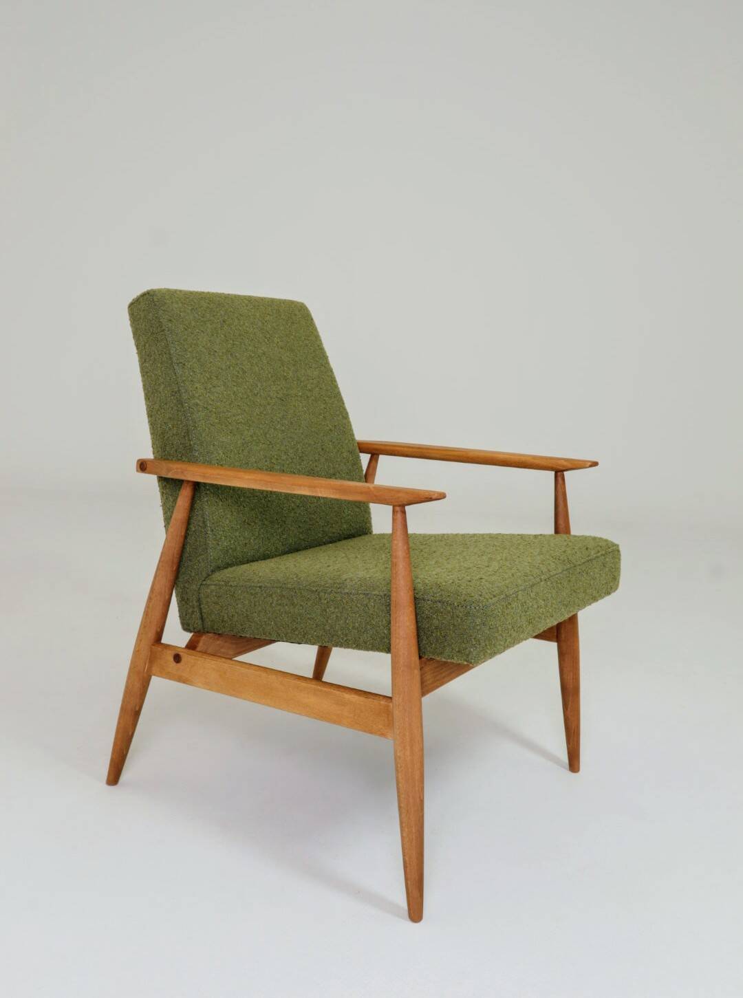 Vintage wild green bouclé armchair design by H.Lis