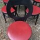 6 vintage Baumann seagull model chairs, black lacquered with red Skai seats.