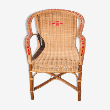 Vintage rattan armchair, rattan chair, wicker armchair with red scoubidou details, veranda, patio