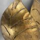 Golden metal "monstera" leaf wall light sconce, france, 1970s