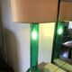 Retro table lamp with glass base and crocodile effect leather shade.