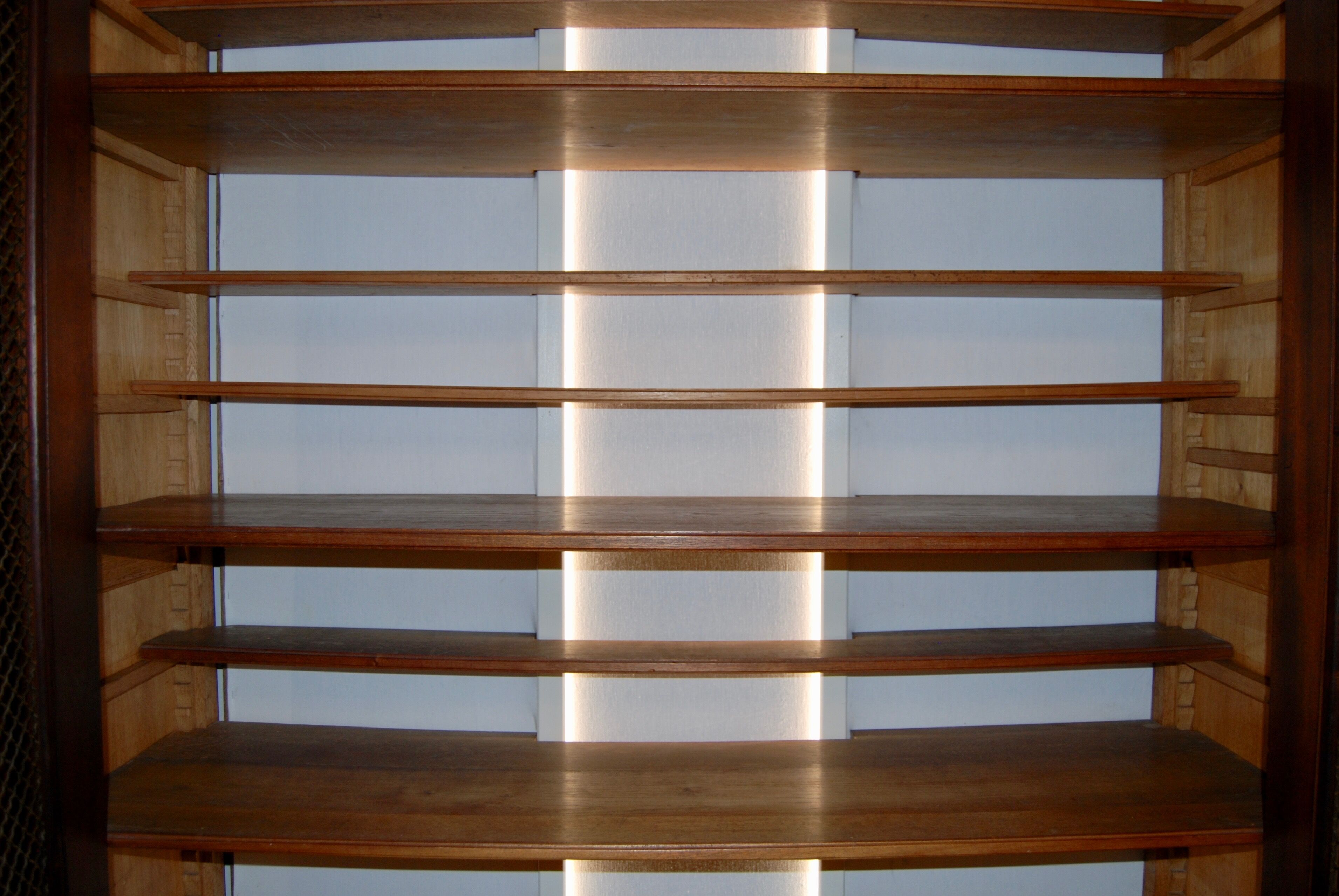 Large Empire library in solid mahogany, late nineteenth century