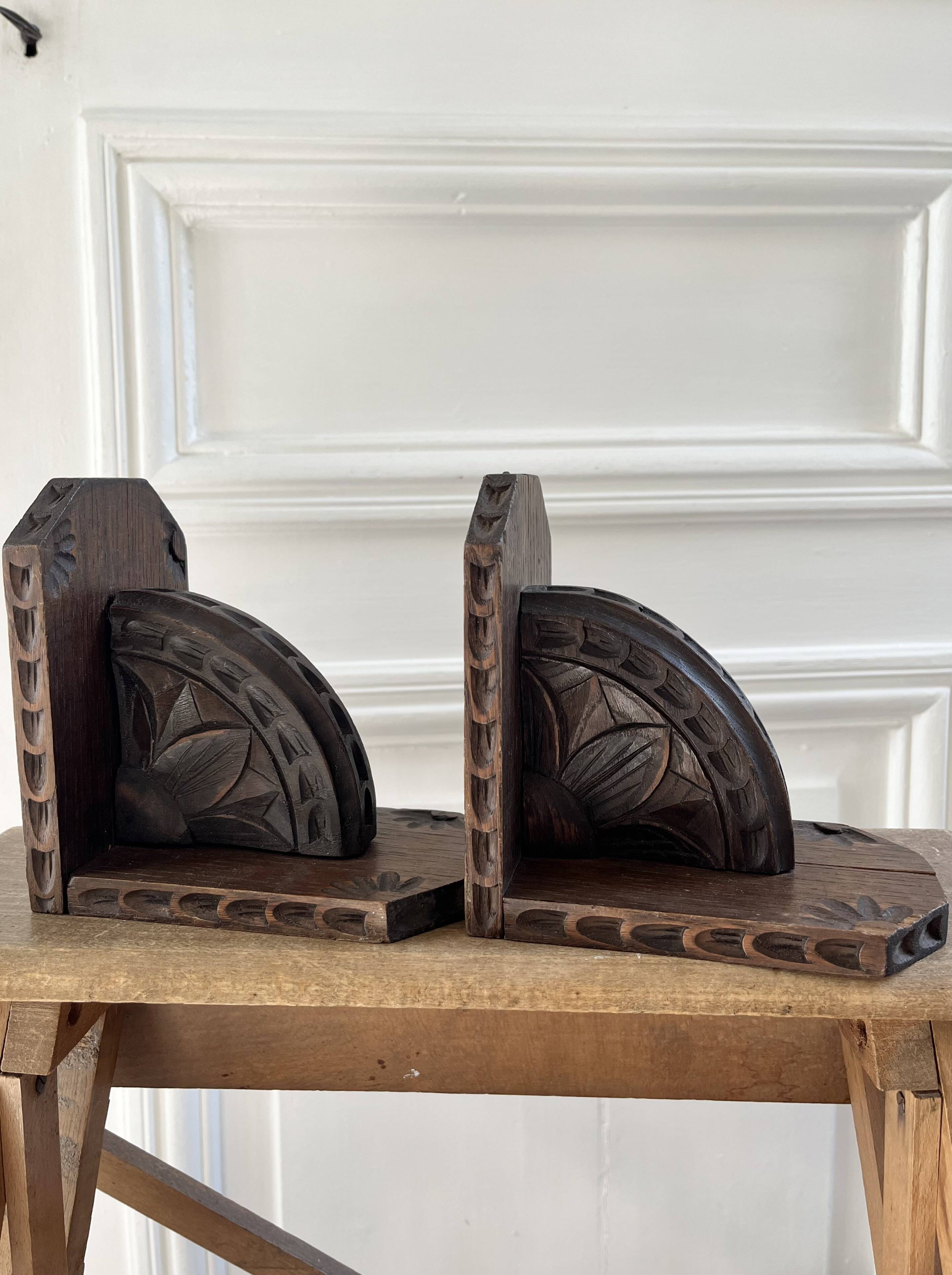 Pair of carved wooden bookends