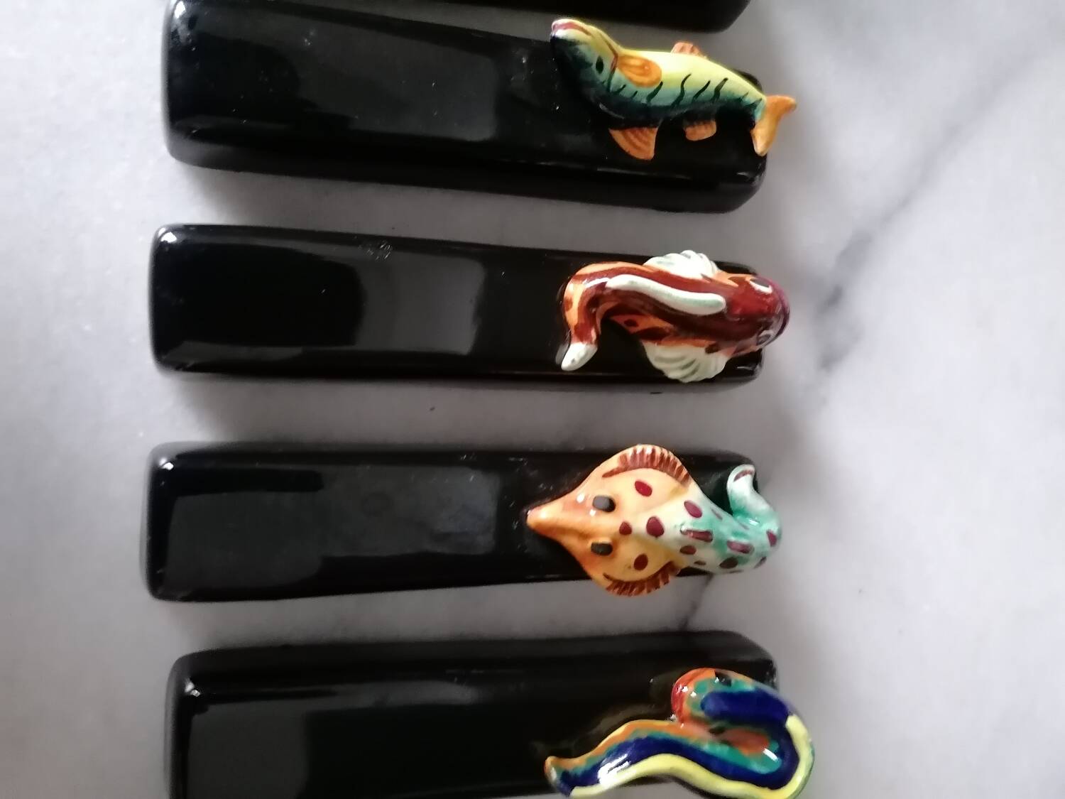 Vintage fish slip knife holders
