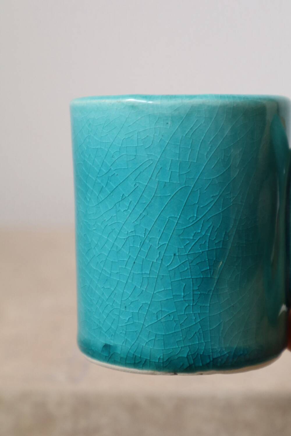 Pair of handmade turquoise ceramic coffee cups with large handles