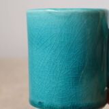 Pair of handmade turquoise ceramic coffee cups with large handles