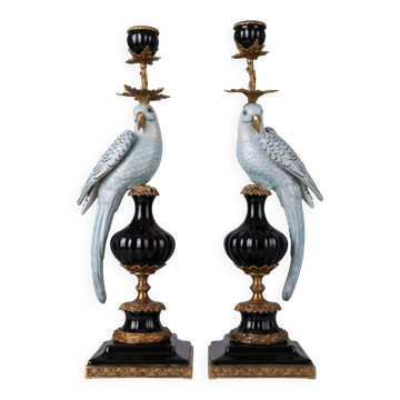 A pair of large candlesticks with parrots in sky blue crackled porcelain and gilded bronze, in an elegant neoclassical style inspired by Louis XVI.