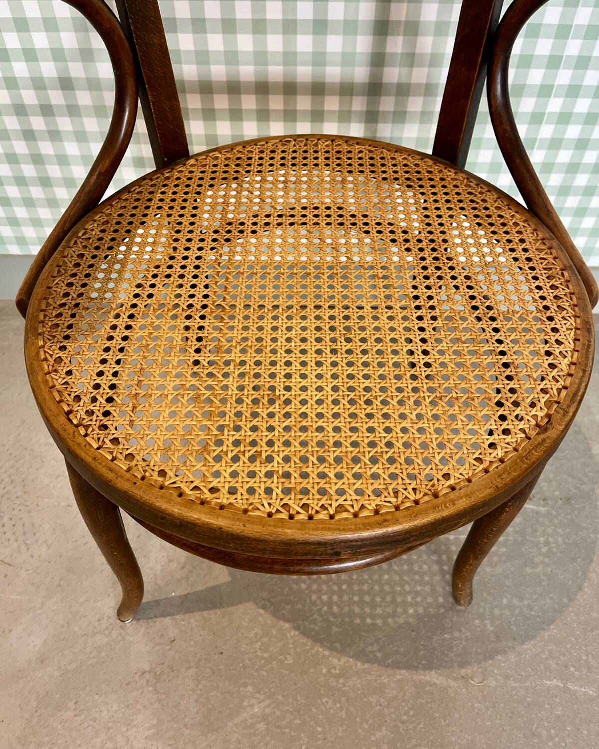 Baumann armchair in curved wood and canework